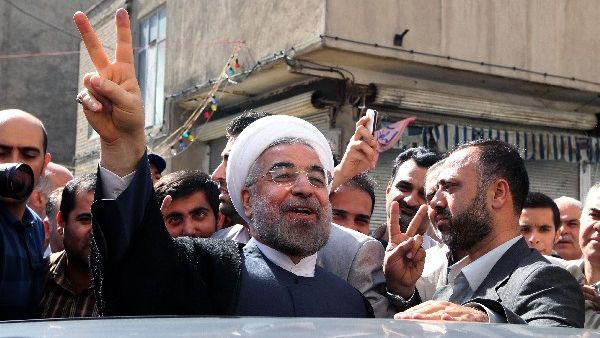 Is the moderate, Western-thinking sentiment behind Rouhani's tweets all a facade? (AFP/File)