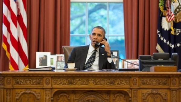 Obama speaks on the phonecall to Iranian president Hassan Rouhani in September. Although Iran is known for its conservatism, it's the hardliners within the US who are more likely to sabotage peace between Washington and Tehran. (AFP/File)