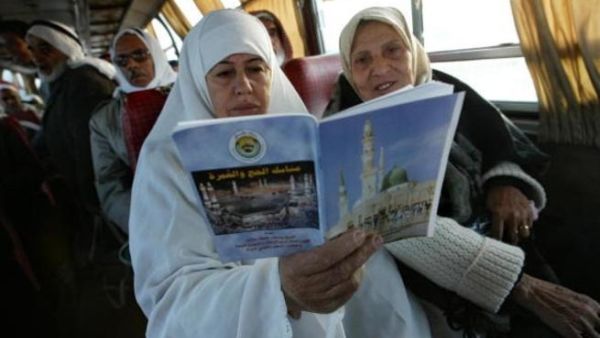 On the move: these women are on the way to Mecca for the Hajj 