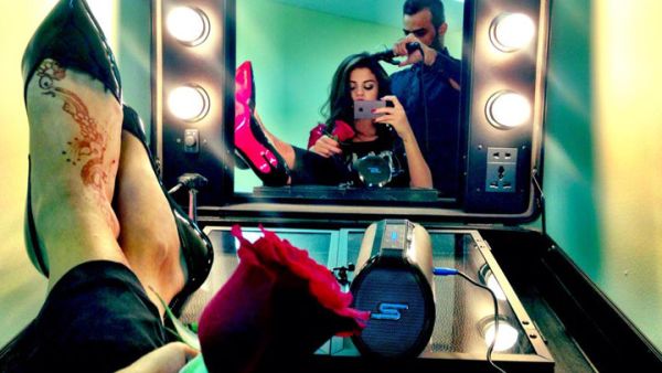 Selena Gomez shows off her henna tattoo as she gets ready to perform at Dubai Music Week. (Image: 7Days)
