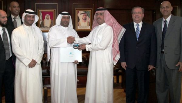 Ahmed Bin Shafar, CEO of Empower and Saeed Al Tayer, Chairman of Empower, shaking hands during the board meeting