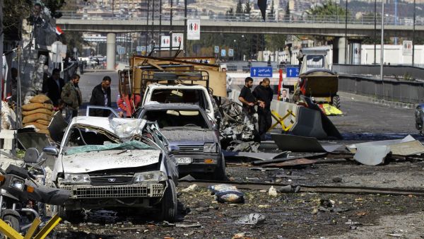 A Syrian car bomb rocks Assad's Damascus HQ