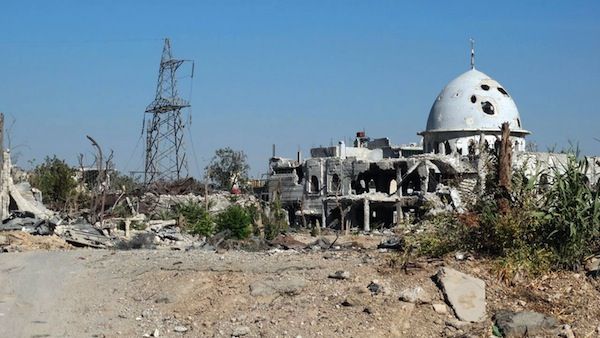 A handout picture from the Syrian opposition shows a mosque damaged in shelling by Syrian government forces in the Damascus suburb of Jobar in early August. (AFP/Shams News Network)