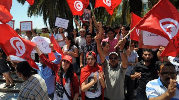 Tunisians have been calling for new government leadership and the oust of Ennahda since MP Mohammed Brahmi's assassination in July (File Archive/AFP)