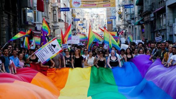 Can Cavusoglu is running to be mayor in a Turkish town, making him the first openly gay person to stand for office. Gay and human rights activists march during anti-government protests on Istiklal Street, the main shopping corridor on June 23, 2013 in Istanbul. (AFP)