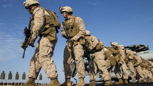 US Marines pivot into position during an exercise on the flight deck of the USS San Antonio in the Mediterranean. Abu Anas al Libi was allegedly interrogated on this ship sailing off the Libyan coast following his abduction on October 6, 2013 by US special forces in Tripoli. (AFP)