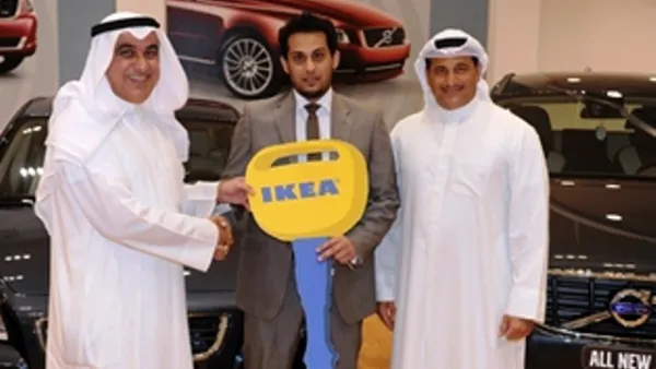 One of the Volvo car winners with IKEA executives