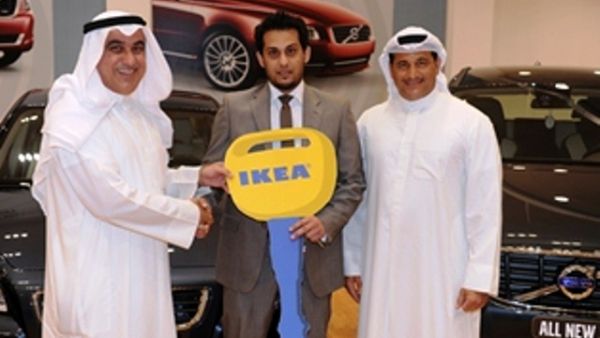 One of the Volvo car winners with IKEA executives