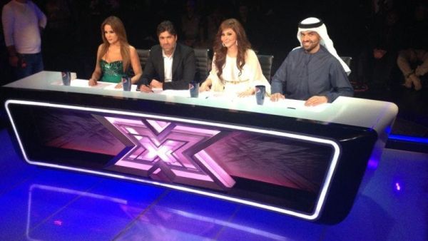 Cat fights on the judging panel on X Factor's live rounds. 