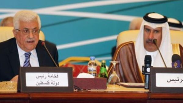 الرئيس الفلسطيني ورئيس الوزراء القطري خلال الاجتماع