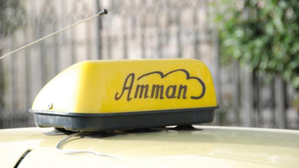 A yellow Taxi cab in Amman.