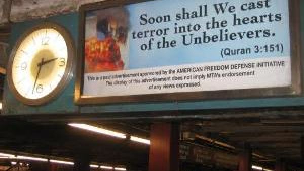 The ads show a burning World Trade Center with a quote attributed to the Quran.