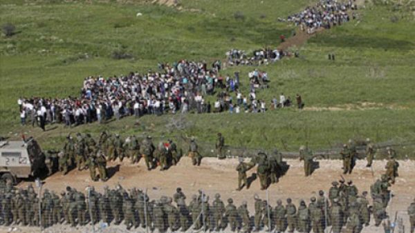 فوات من الجيش الاسرائيلي في مواجهة متظاهرين في مسيرة العودة في ايار الماضي