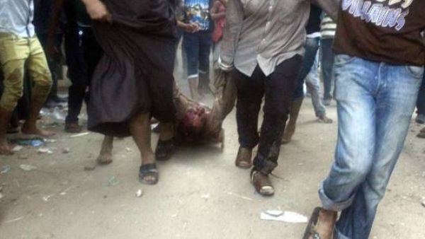 صورة من مقطع فيديو لسحل احد الشيعة الاربعة القتلى في واقع ابو النمرس