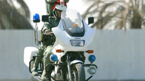 Dubai Police swap guns for microphones as they get set to record an anti-narcotics song (Photo: xkmph.com)