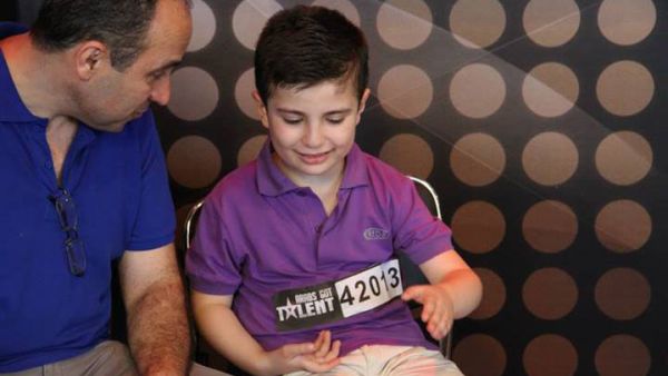 Eight-year-old Nael Traboulsi made it through his house being bombed in Syria to the AGT stage (Image: Facebook)