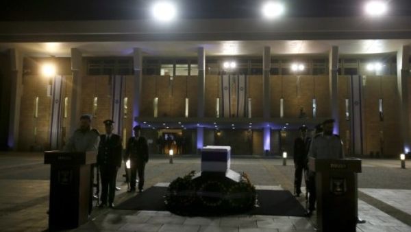 While Israel remembers a war hero, many folks in the Middle East and around the world remember a war criminal (Gali Tabbon/AFP)