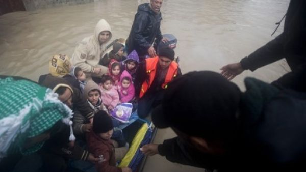 Rescue services have been evacuating thousands of Gazans from their homes due to heavy flooding that has left many homes underwater (Mahmud Hams/AFP) Rescue services have been evacuating thousands of Gazans from their homes due to heavy flooding that has left many homes underwater (Mahmud Hams/AFP)