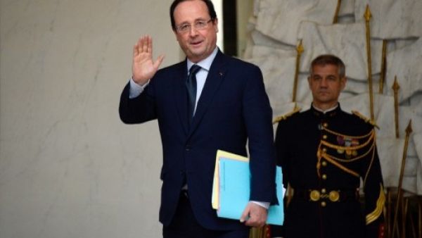 The French president will meet with both Hariri and Jarba in Saudi Arabia this week (Bertrand Guay/AFP)
