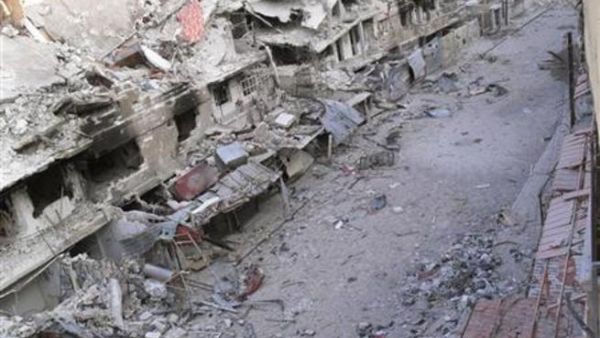 مبان مدمرة عقب اشتباكات بين قوات حكومة ومقاتلين في حمص 