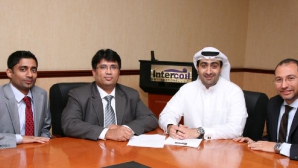 Executives during the agreement signing