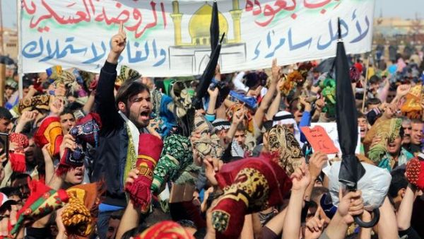 Iraqi protestors shout slogans during a demonstration in the Iraqi city of Samarra in early March demanding the ousting of Prime Minister Nouri al-Maliki. (AFP PHOTO / MAHMOUD AL-SAMARRAI) Iraqi protestors shout slogans during a demonstration in the Iraqi city of Samarra in early March demanding the ousting of Prime Minister Nouri al-Maliki. (AFP PHOTO / MAHMOUD AL-SAMARRAI)