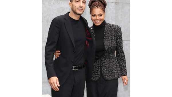 Wissam al Mana and Janet Jackson attending the Giorgio Armani fashion show during Milan Fashion Week (Photo by Vittorio Zunino Celotto/Getty Images)