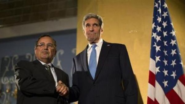 وزير الخارجية الامريكي جون كيري ونظيره المصري نبيل فهمي 
