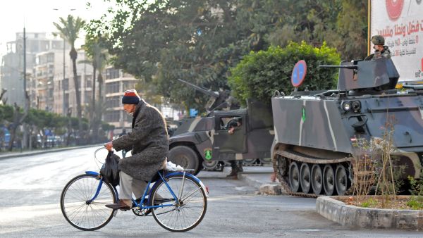 The war in Syria has spilled over into Lebanon, heightening sectarian tension and violence particularly within the northern city of Tripoli (Ibrahim Chalhoub/AFP)