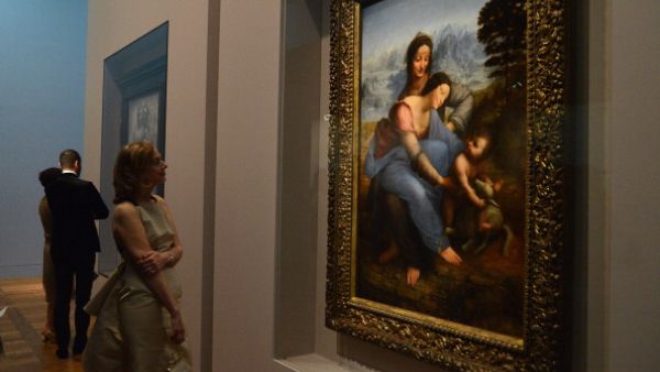With a built up area of 64,000 sq m, Louvre Abu Dhabi is conceived as a complex of pavilions, plazas, alleyways and canals, evoking the image of a city floating on the sea. Pictured:' Divinci's The Saint Anne' at Musee du Louvre, Paris-Getty. 