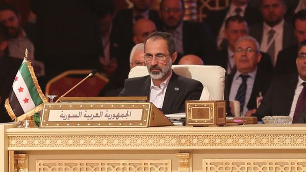 Moaz al-Khatib attends the Arab League summit in Doha (AFP Photo)