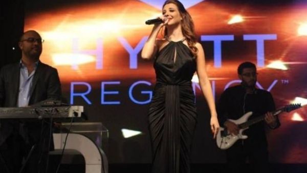 Nancy's bulging dress around the stomach area also raised fans' suspicions that she could be preggers. (Image: Facebook) 