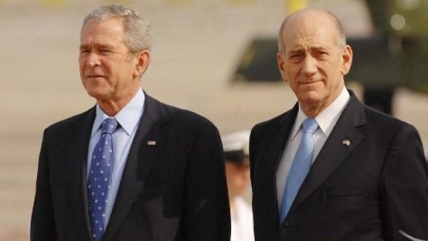 Ehud Olmert pictured here with former U.S. President George W. Bush, served as Israel's prime minister from 2006-2008 before resigning over graft allegations (File Archive/AFP)