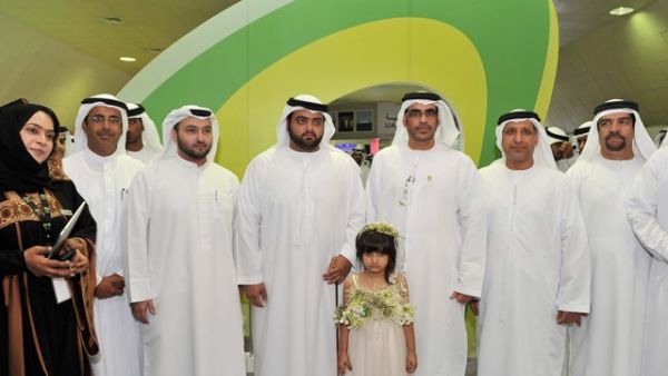 صورة جماعية لمدراء وموظفي اتصالات أثناء مشاركتهم في المعرض