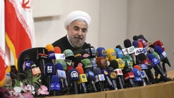 During a press conference Sunday regarding the historic deal between Iran and world powers on the latter's nuclear program, Iranian president Hassan Rouhani reiterated to reporters that his country would "never" seek atomic weapons (File Archive/AFP)