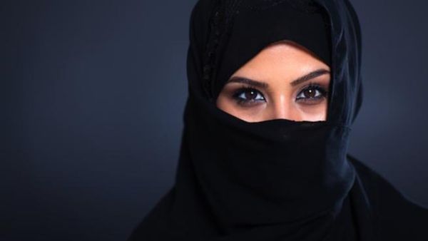 Violence is on the rise against women and children in Saudi Arabia. (Veiled face/ michaeljung/Shutterstock)