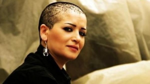 Syrian actress, Suzan Skaf, in her new shaved head look. (Photo courtesy Sayidaty)