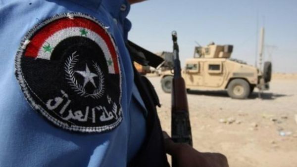 شرطي عراقي على حاجز قرب تكريت
