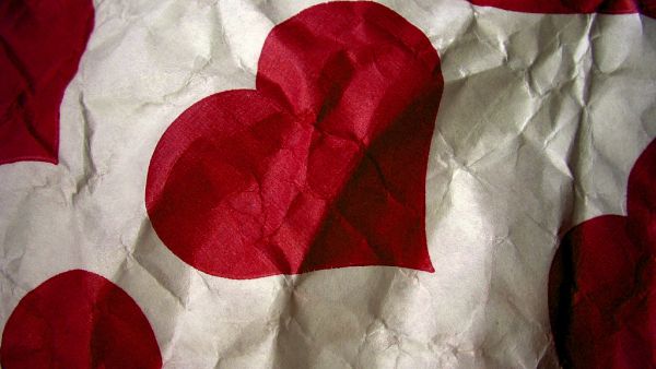 Valentine's Day or Single Awareness Day? Depends on what side of the crumpled wrapping paper you're looking at.
