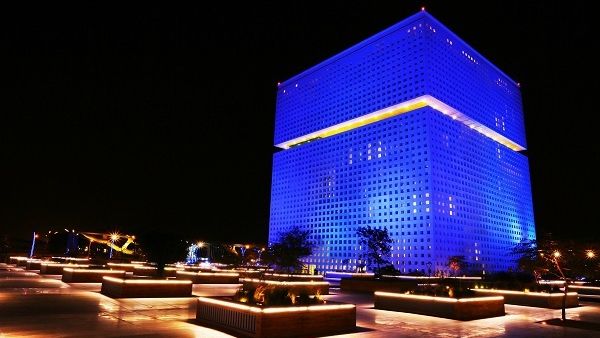 The building in Education City bathed in blue light.