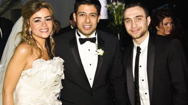 Mohamed with his beautiful ex-wife on their wedding day. (Taghollywood.com)