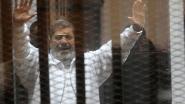 The former president and Muslim Brotherhood leader was tried in May after being charged with responsibility for a mass prison break in 2011. Now his trial is reset for June 26. (AFP/File)