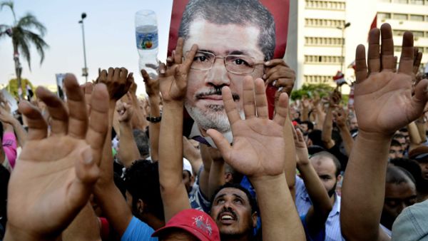 Muslim Brotherhood supporters of former president Mohammad Morsi are seen in a protest in Cairo in 2013. (File)