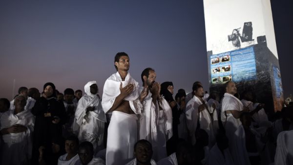 Muslim pilgrims pray as they join one of the Hajj rituals on Mount Arafat near Mecca. (AFP/Mohamed Elsheikh)