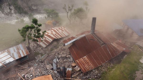 Damaged houses are seen from an Indian Army helicopter at Lapu in the Nepalese area of Gorkha on April 28, 2015. (AFP/Sajjad Hussain)