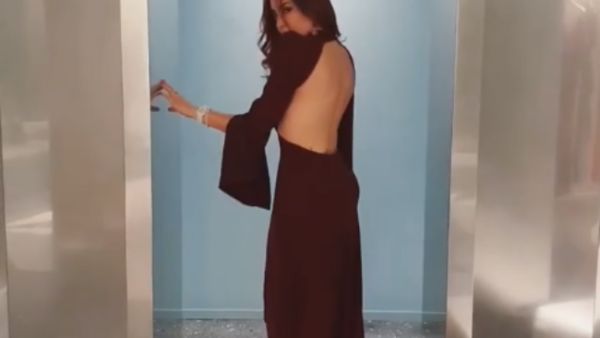 Tafesh posted a video in which she is wearing a dress that reveals her back (Source: nesreentafesh - Instagram) Tafesh posted a video in which she is wearing a dress that reveals her back (Source: nesreentafesh - Instagram)