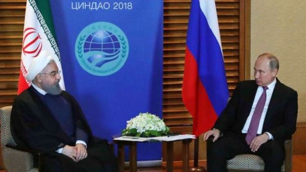 بوتين خلال لقائه نظيره الإيراني حسن روحاني