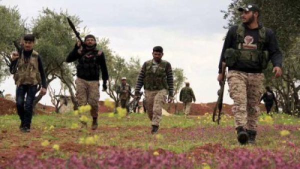 مقاتلون من الفصائل المسلحة في سوريا