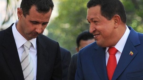 شافيز يستقبل الاسد