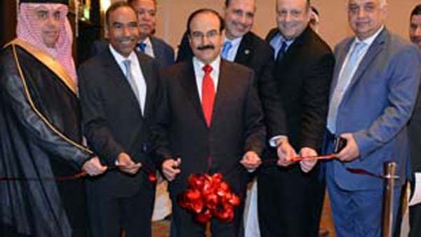 Dr Mirza opens the office, watched by other officials. Image: courtesy BNA. Dr Mirza opens the office, watched by other officials. Image: courtesy BNA.